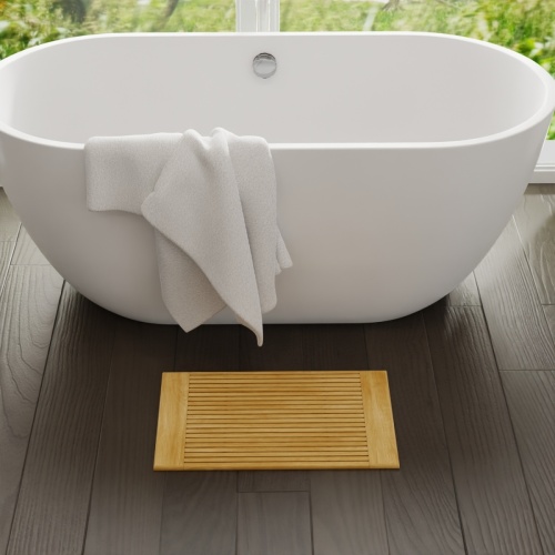 18421 Pacifica Bath Mat side angled view on bathroom tile floor in front of soaking tub 